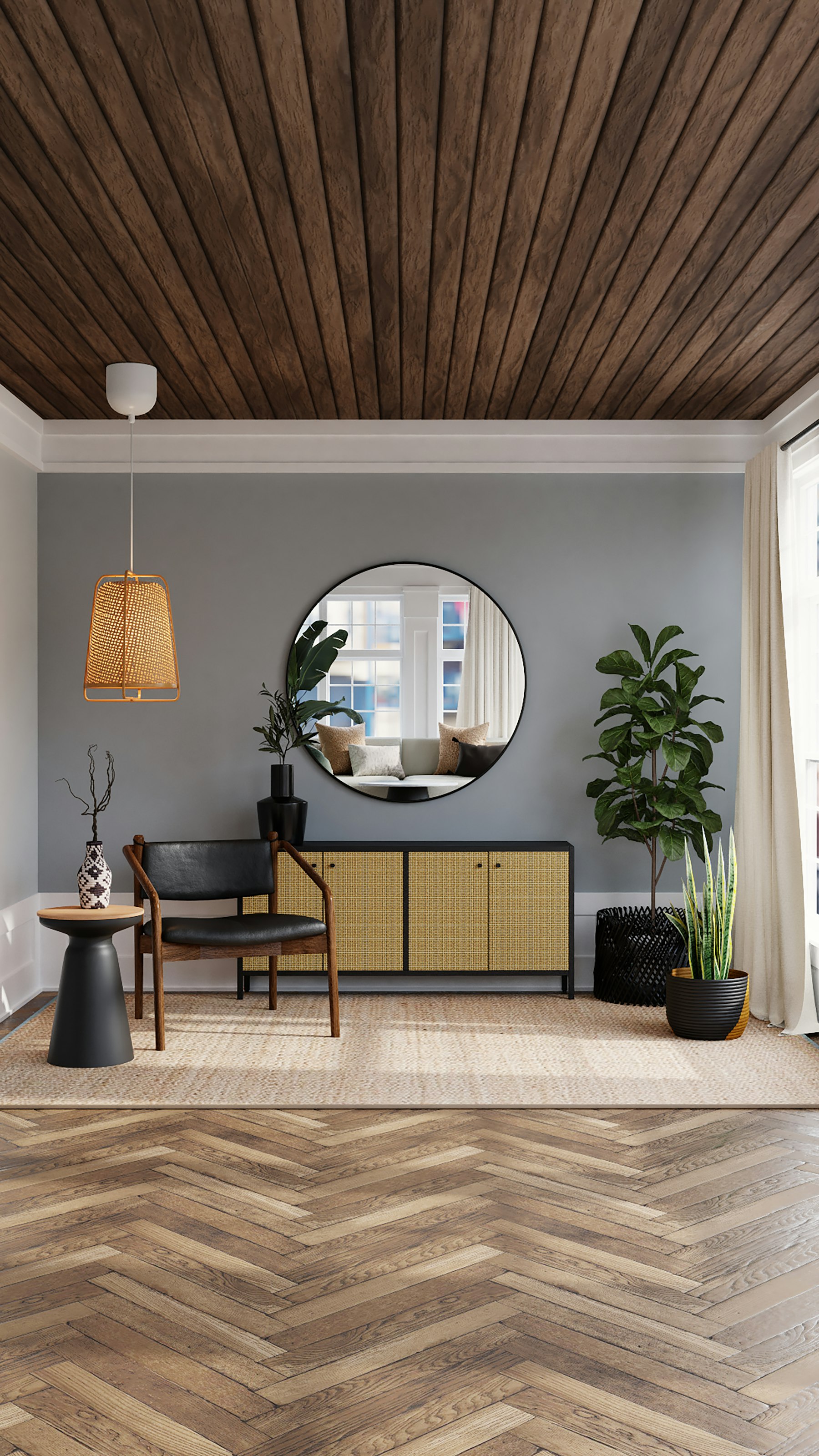 Entrance foyer with a wood-clad ceiling, round mirror and rattan sideboard